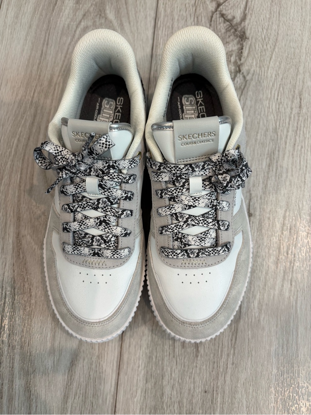 Skechers White with some sparkle on the back heel Snake-Print Low Top Sneakers